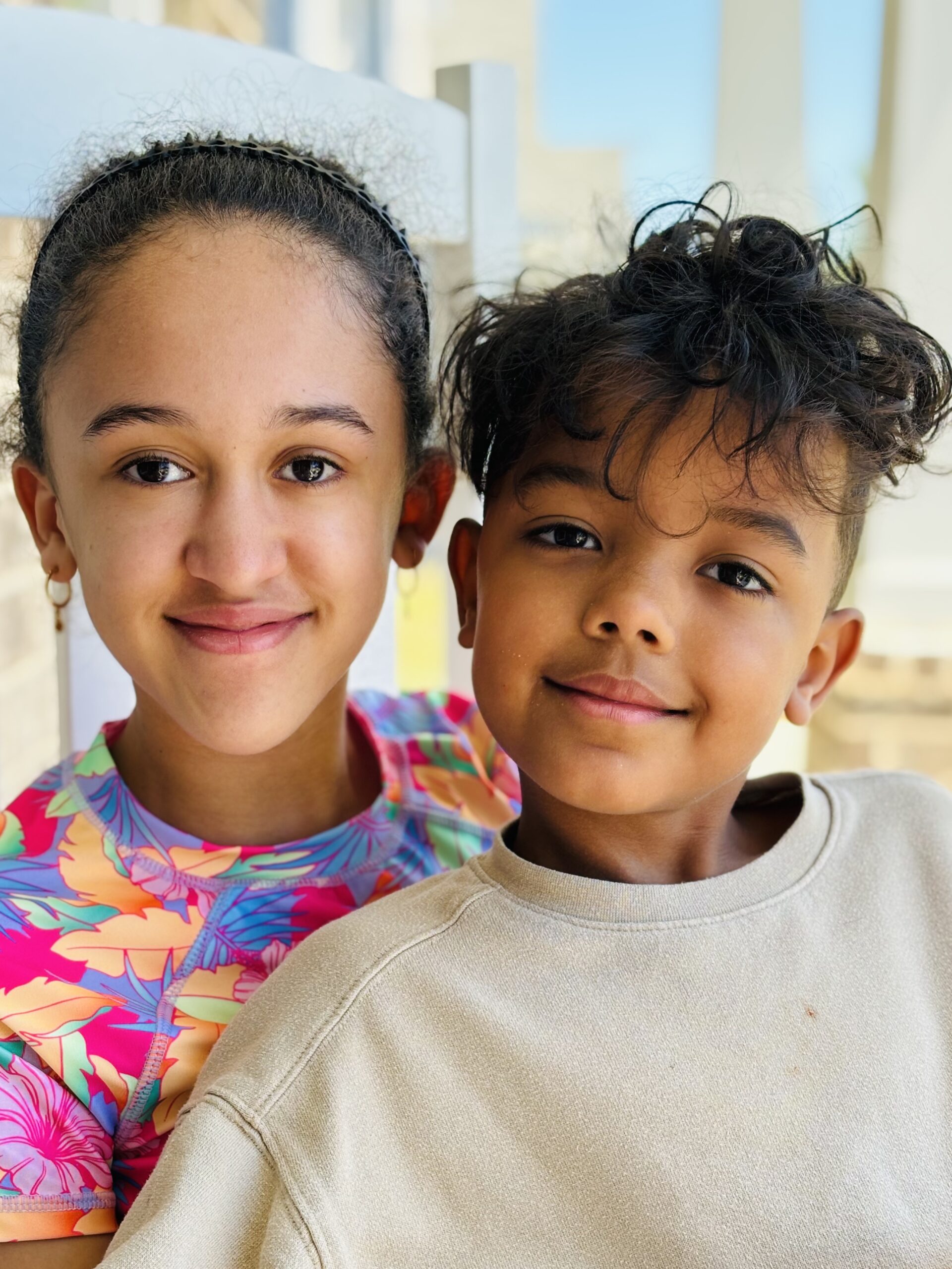 Alex and Sophia Broadnax, junior explorers of The Wandering Kin, smiling and ready for their next adventure.