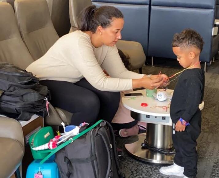 Mother and child waiting at Atlanta airport lounge