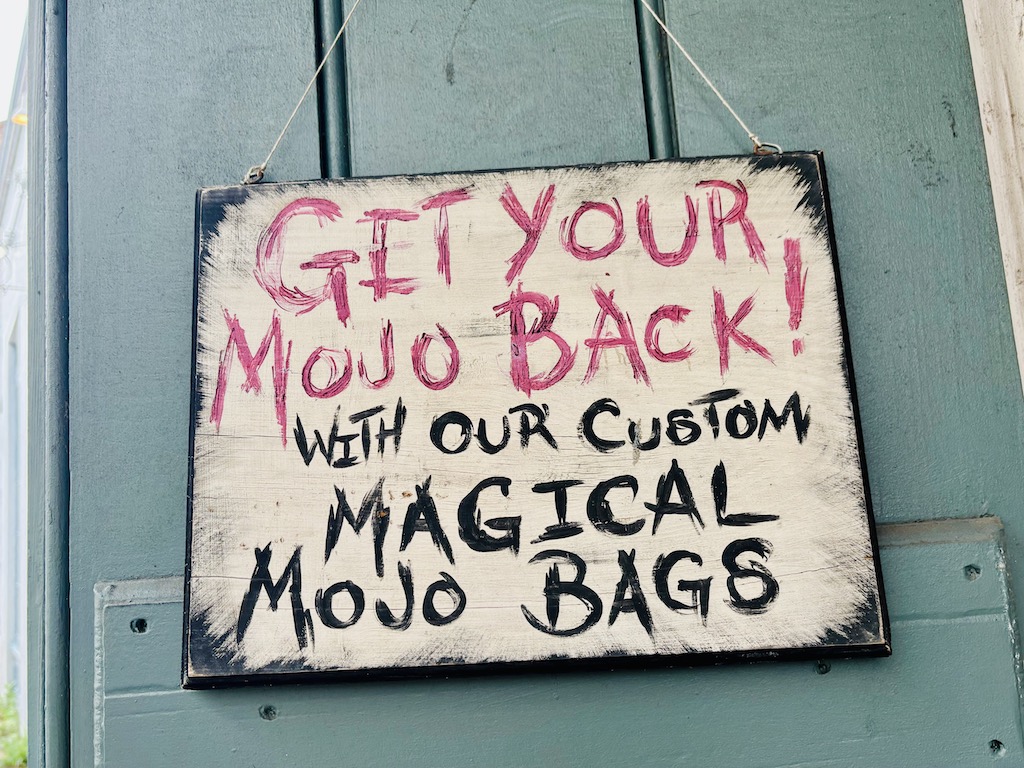 Sign Advertising Mojo Bags on the Way to the French Quarte